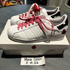 Adidas Superstars size 8. Women 1 time. Run a little big